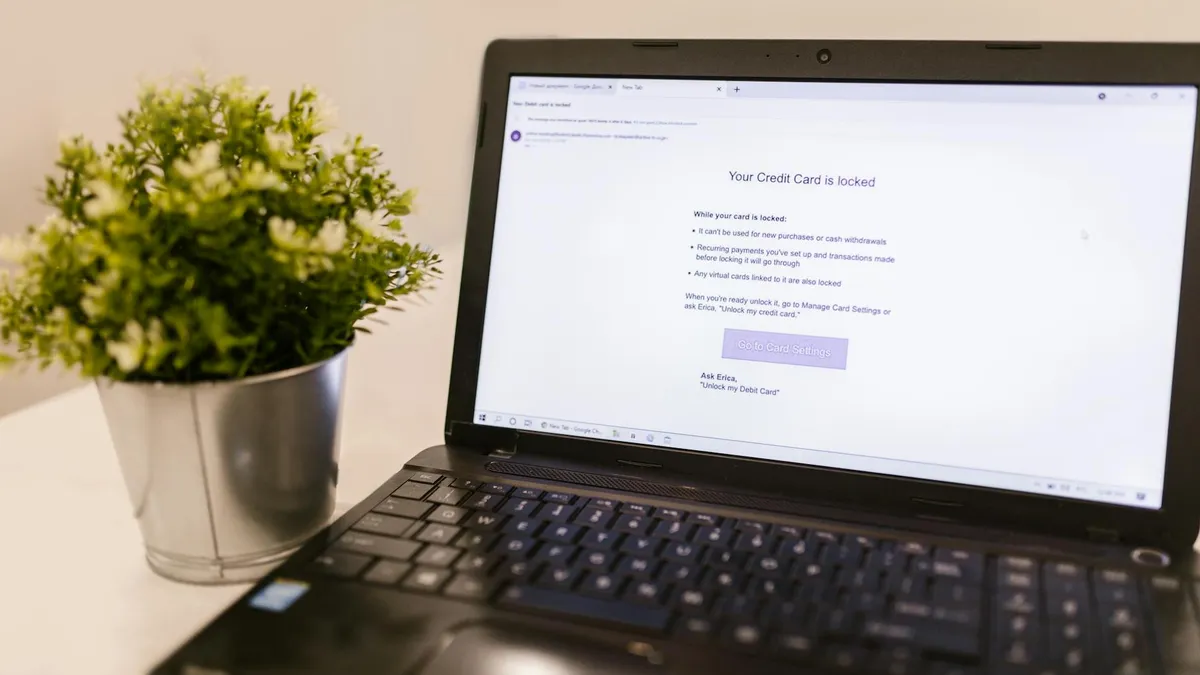 Laptop screen showing a web security notification in a work environment