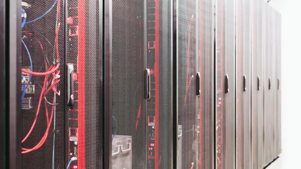 Server room with organized cables connecting business data systems